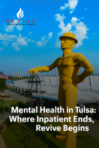 The Golden Driller statue in Tulsa stands tall with the Revive Counseling & Life Coaching logo above, symbolizing local leadership in mental health services and community strength.